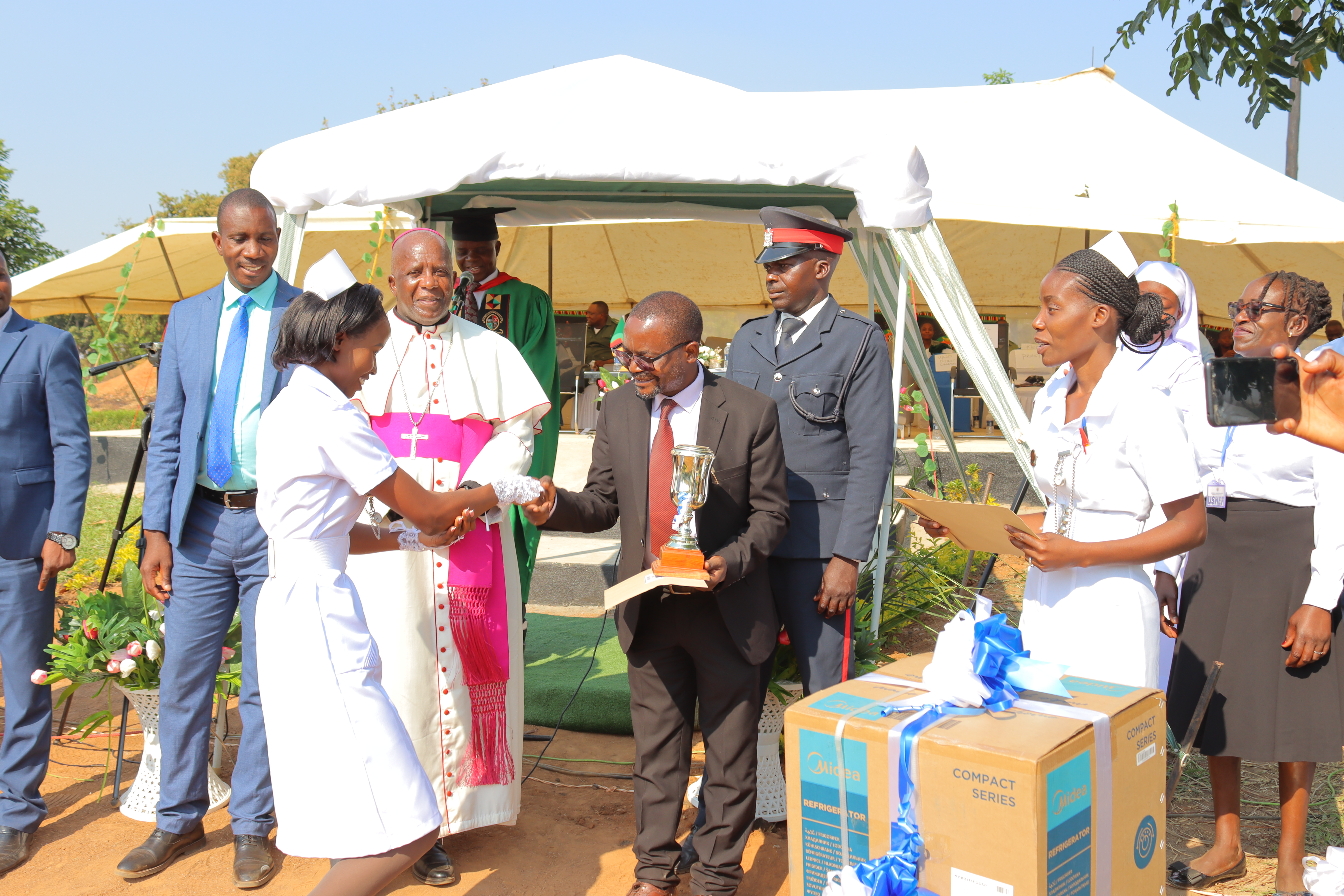 Graduate receiving diploma